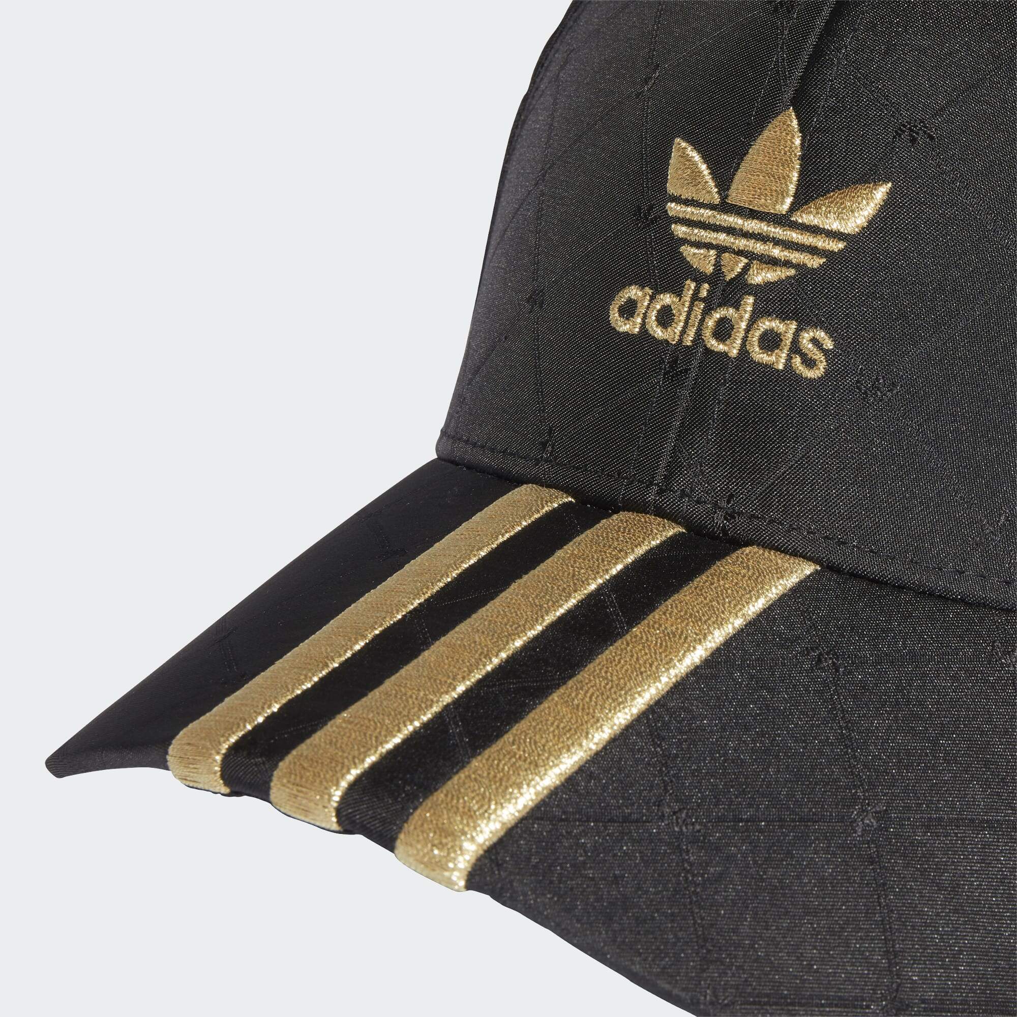 adidas mit goldener kappe